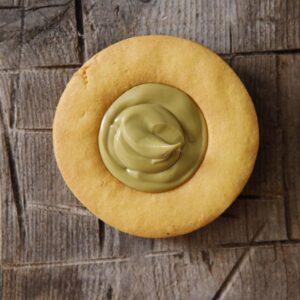 Occhio di bue, biscotto di frolla con nutella,pistacchio e cioccolato bianco